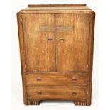 ART DECO CABINET, limed oak with two panel doors enclosing shelves above two drawers, 90cm W x 125cm