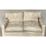 SOFA, traditional two seater ivory brocade upholstered with down feather filled cushions, 135cm W.