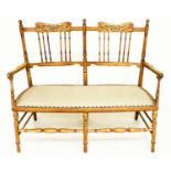 HALL BENCH, Edwardian fruitwood with incised and spindle back and studded linen upholstered seat,