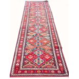 ANTIQUE KAZAK RUNNER, 330cm x 100cm.