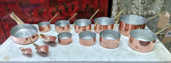 BATTERIE DE CUISINE, comprising of a graduated set of five copper pans, the largest 20cm diam,