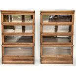 GLOBE WERNICKE BOOKCASES, a pair, early 20th century oak each with four stacking glazed sections,