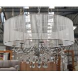 CHANDELIER, 100cm high, 70cm diameter, six branch, polished metal with glass drops and cord shade.