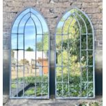 ARCHITECTURAL GARDEN MIRRORS, pair, Gothic style, applied glazing bars, aged metal frames, 140cm
