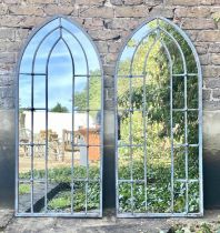 ARCHITECTURAL GARDEN MIRRORS, pair, Gothic style, applied glazing bars, aged metal frames, 140cm