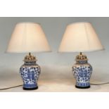 TABLE LAMPS, a pair, Chinese blue and white of ginger jar form, with conical shades, 65cm H. (2)