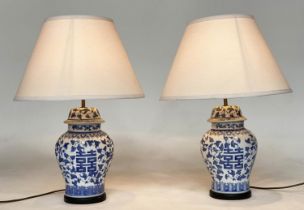 TABLE LAMPS, a pair, Chinese blue and white of ginger jar form, with conical shades, 65cm H. (2)