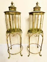 FLOOR STANDING LANTERNS, a pair, 120cm high, 36cm diameter, French provincial style glazed sides,