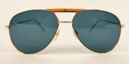 GUCCI SUNGLASSES, gold tone and mother of pearl style arms, with amber coloured front detailing,
