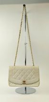 CHANEL VINTAGE DIANA QUILTED BAG, with rounded front flap closure and iconic interlocking CC lock,
