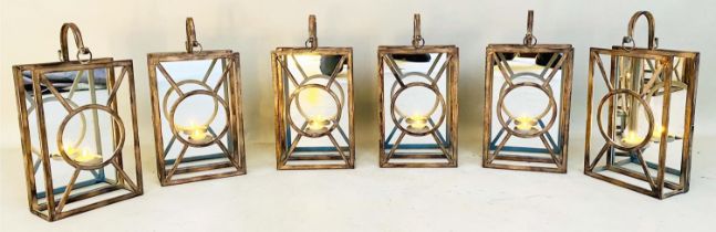 WALL HANGING CANDLE LANTERNS, a set of six, Art Deco style, mirrored backs, 43cm x 22cm x 11cm. (6)