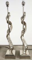 TABLE LAMPS, a pair, polished metal, swirling design, 59cm H. (2)