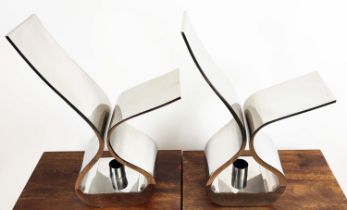 TABLE LAMPS, a pair, each 49cm H x 38cm W, polished metal ribbon design, attributed to Kelly Hoppen.