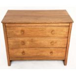 GORDON RUSSELL CHEST, oak with three long drawers and signature label 'Gordon Russell Broadway