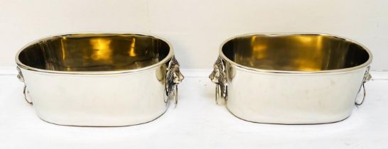 CHAMPAGNE COOLERS, a pair, 16cm high, 45cm wide, 26cm deep, lion head ring handles, silver plated