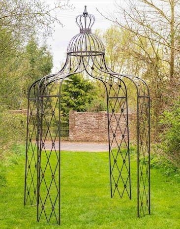 ARCHITECTURAL GARDEN PERGOLA, 325cm H x 200cm diam., Regency style, aged finish, crown pediment.