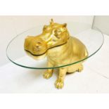 HIPPOPTAMUS LOW TABLE, 65cm x 50cm x 45cm, gilt resin and glass.