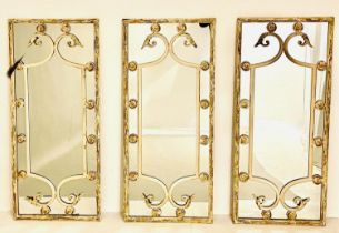 ARCHITECTURAL WALL MIRRORS, set of three, 112cm high, 48cm deep, regency style, aged white painted