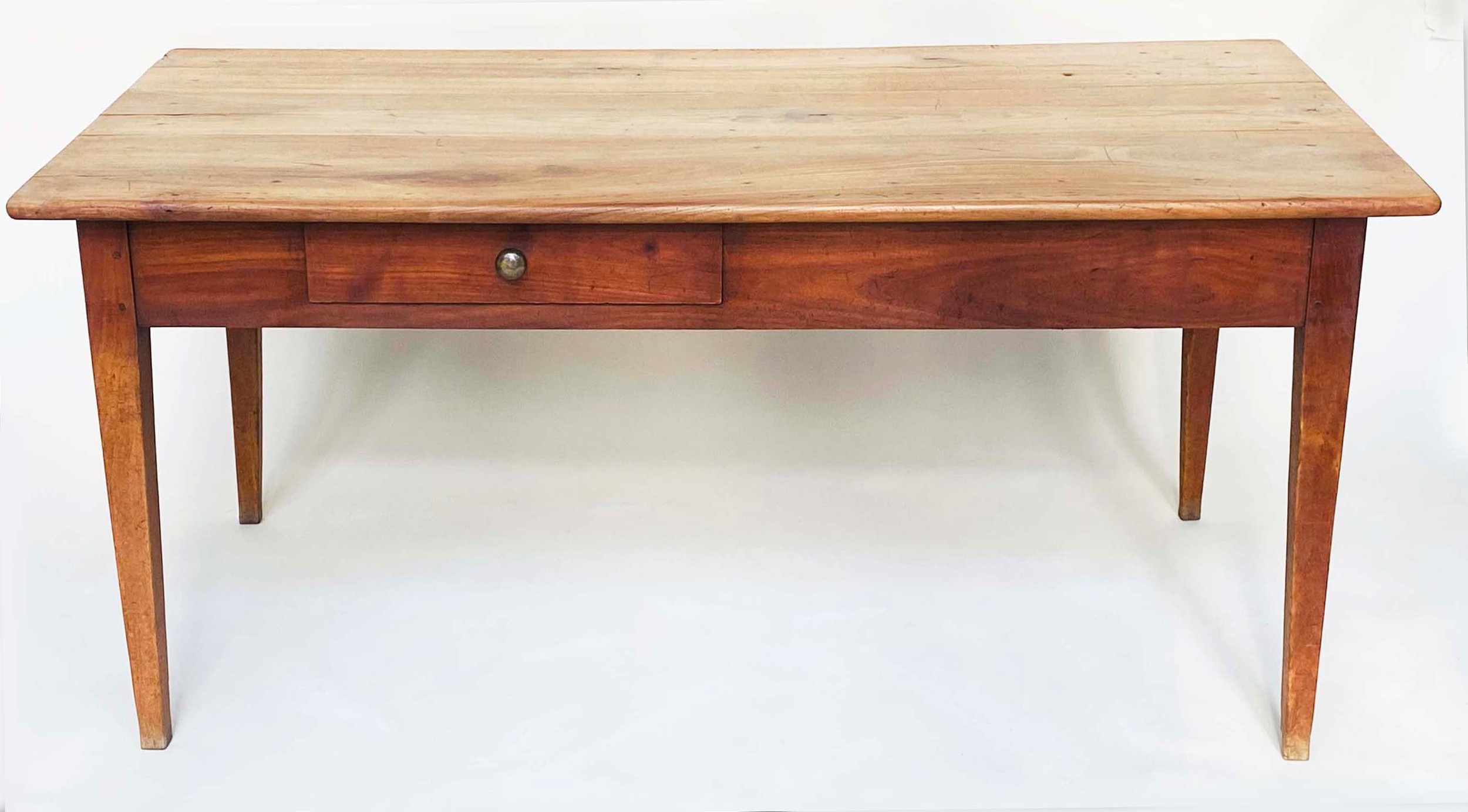 FARMHOUSE TABLE, 19th century French cherrywood with planked top opposing frieze drawers and