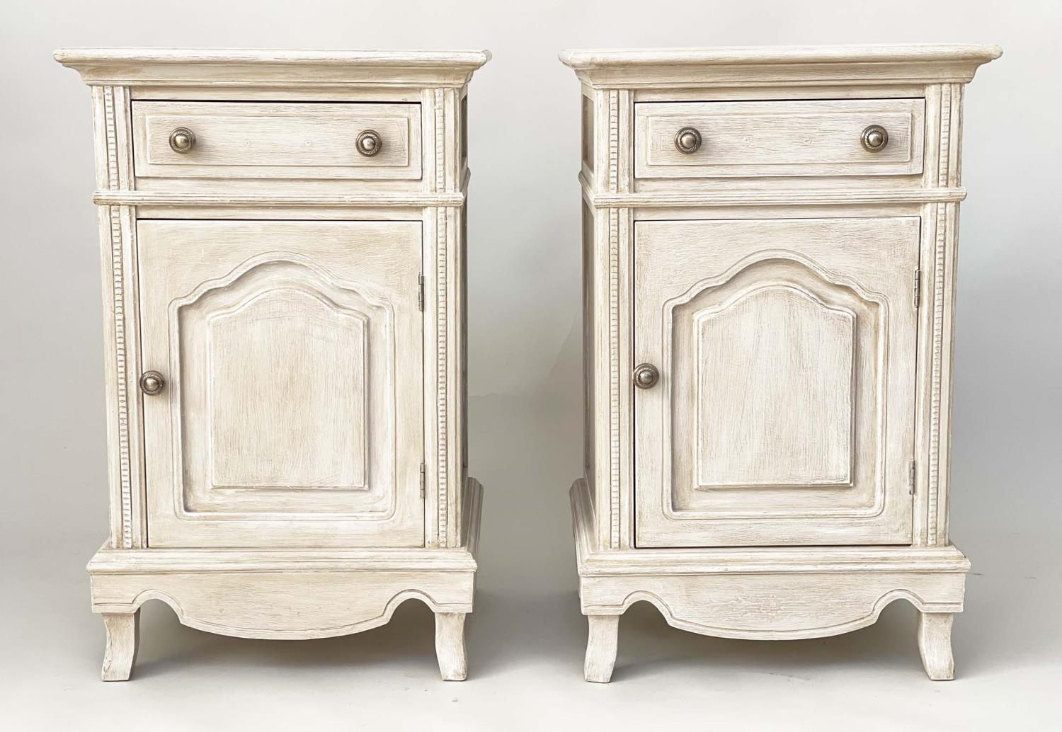 BEDSIDE CABINETS, a pair, French Louis XV style traditionally grey painted each with drawer and