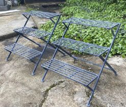 GARDEN ETAGERES, a pair, 63cm H x 62cm W x 60cm D, three tier, lead grey painted metal. (2)