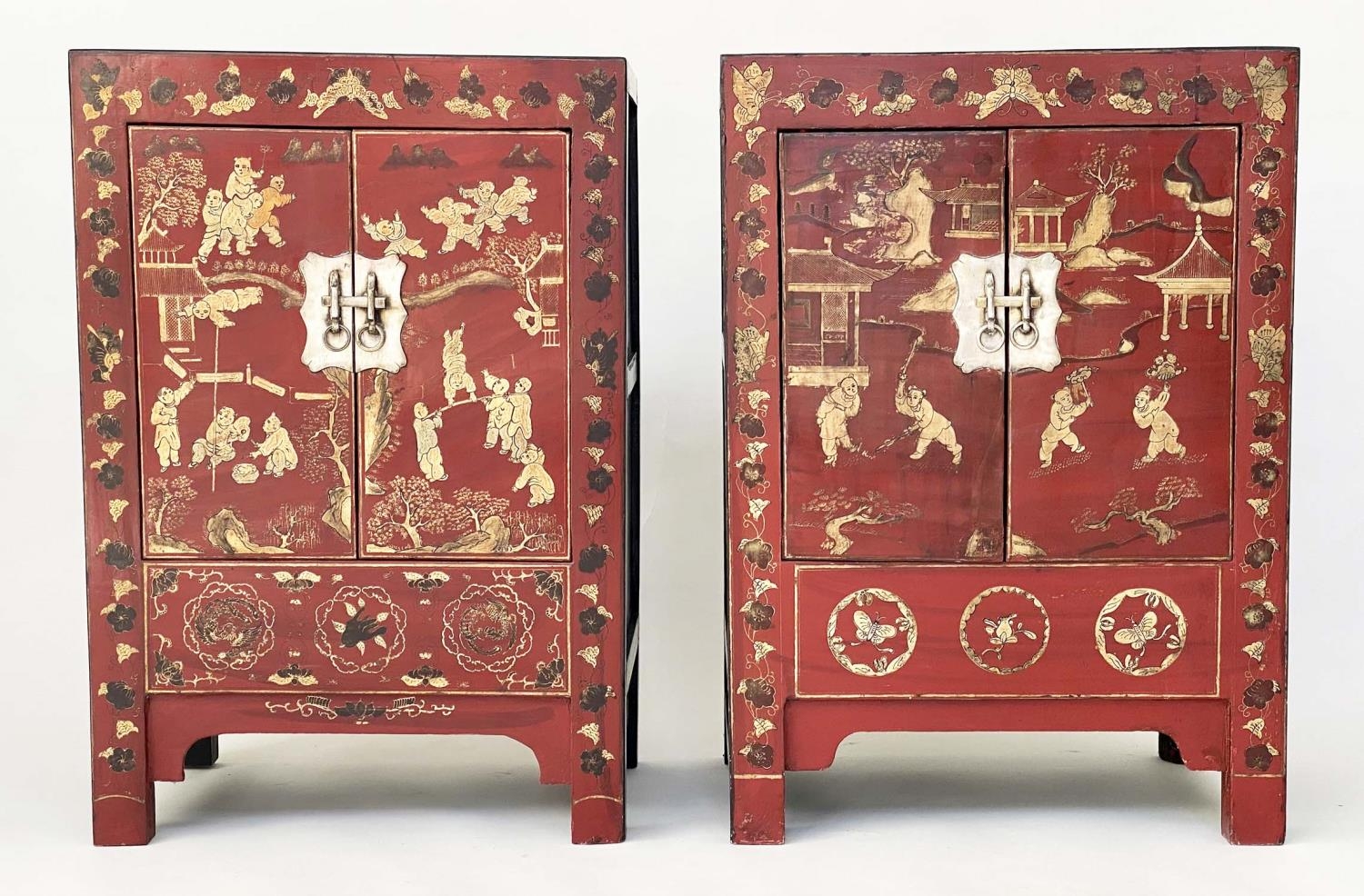 CHINESE CABINETS, a pair, early 20th century scarlet lacquered Chinoiserie gilt decorated and