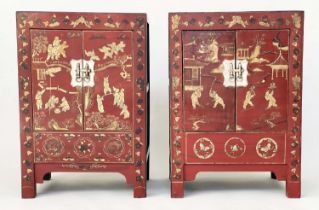 CHINESE CABINETS, a pair, early 20th century scarlet lacquered Chinoiserie gilt decorated and