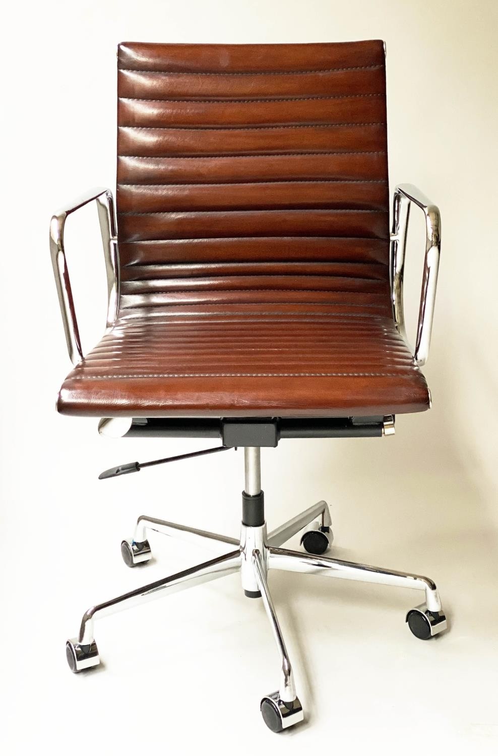 REVOLVING DESK CHAIR, Charles and Ray Eames inspired with ribbed mid brown leather seat revolving - Image 3 of 8