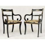 ELBOW CHAIRS, a pair, Regency design, lacquered and gilt with Andrew Martin 'Safari', fabric