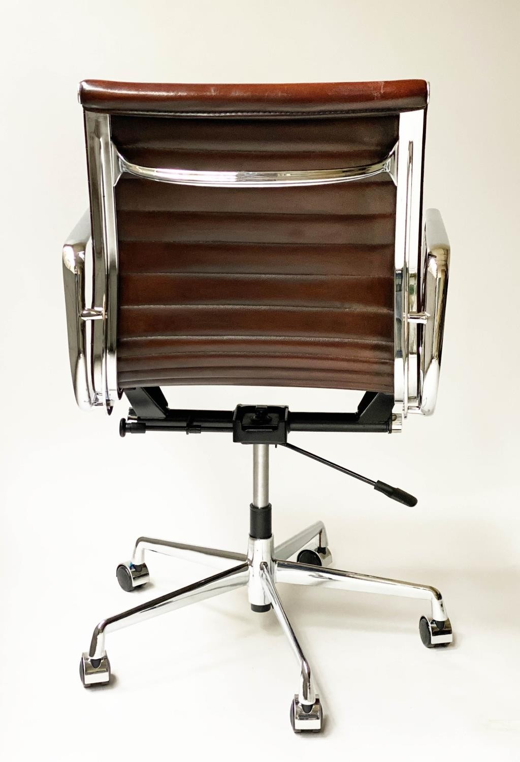 REVOLVING DESK CHAIR, Charles and Ray Eames inspired with ribbed mid brown leather seat revolving - Image 5 of 8