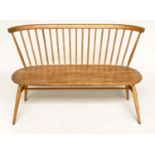 'ERCOL' HALL BENCH, 1970s beech and elm with slightly arched spindle-back attributed to 'Ercol',