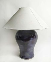 TABLE LAMP, glazed ceramic with oversized shade, 88cm H.