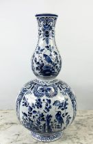 DELFT DOUBLE GOURD VASE, late 19th/early 20th century with blue and white scrolling foliate and bird