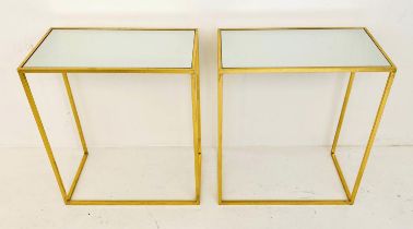 SIDE TABLES, 66cm high, 56cm wide, 30cm deep, a pair, 1960s French style, gilt metal and glass. (2)