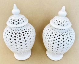 JARS AND COVERS, 50cm high, 25cm diameter, Blanc de Chine style ceramic, perforated design,