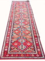 ANTIQUE KAZAK RUNNER, 330cm x 100cm.