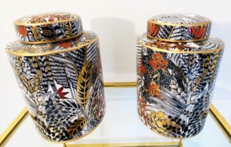 GINGER JARS, 30cm H x 20cm diam, a pair, glazed ceramic with foliate print design. (2)