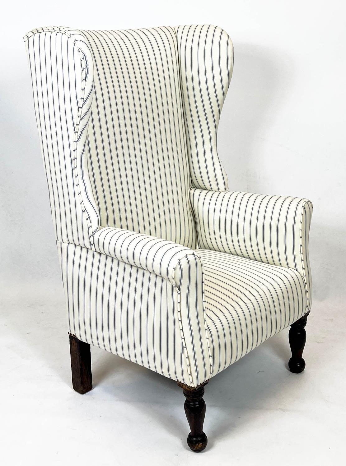 WING ARMCHAIR, 115cm H x 71cm W, 19th century stained pine in new ticking upholstery.
