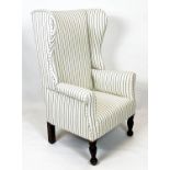 WING ARMCHAIR, 115cm H x 71cm W, 19th century stained pine in new ticking upholstery.