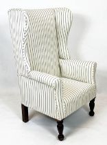 WING ARMCHAIR, 115cm H x 71cm W, 19th century stained pine in new ticking upholstery.