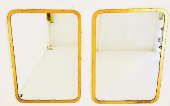 WALL MIRRORS, a pair, 97cm H x 68cm W, gilt metal frames. (2)