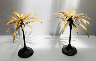 PALM TREE CANDLESTICKS, a pair, 46cm high, gilt palm leaves, black stands. (2)