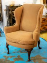 WING ARMCHAIR, 110cm H x 87cm W, George I style in brown material.