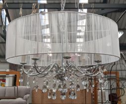 CHANDELIER, 100cm high, 70cm diameter, six branch, polished metal with glass drops and cord shade.