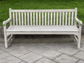 GARDEN BENCH, silvery weathered teak of slatted and pegged construction, 180cm W.