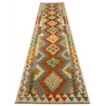 CONTEMPORARY ANATOLIAN DESIGN KILIM RUNNER, 304cm x 82cm.