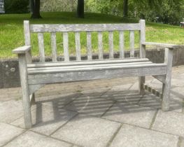 LISTER GARDEN BENCH, silvery weathered teak of slatted construction with flat top arms, 128cm W.