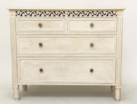 COMMODE, French style traditionally grey painted with pierced frieze and four drawers, 75cm H x 89cm
