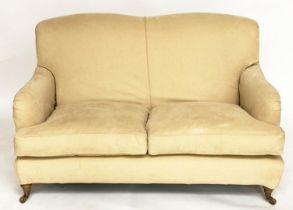 SOFA, Howard style with rounded backs and arms and shaped sides with close fitting yellow linen