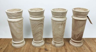 VASES, a set of four, turned wood, 53cm H. (4)